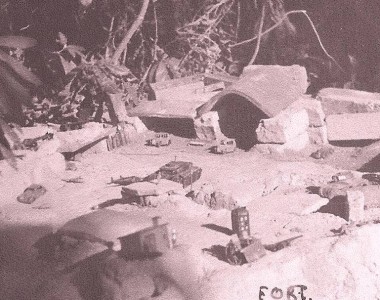 Dinky toys, self made buildings. No doubt constructed somewhere on the bank of the lower terrace.Contributed by Hugh Weir