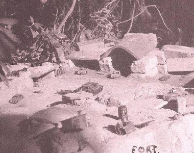 Dinky toys, self made buildings. No doubt constructed somewhere on the bank of the lower terrace.Contributed by Hugh Weir