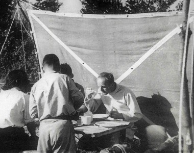 Major Todd Gamon, a teacher at Newells, with his wife Nikki came to visit the camp and stayed the night. Here taking breakfast. Photo by Mr Colin Mansfield