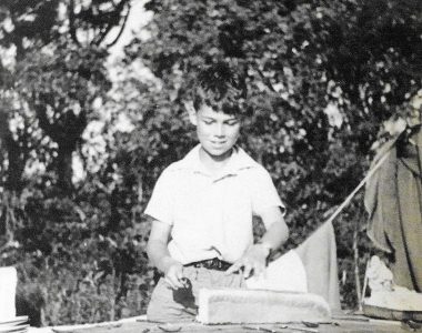 Reid Minor, cutting the bread .